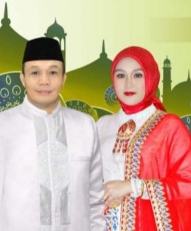 Bupati Muna Barat, LM Rajiun Tumada., M. Si Bersama Istri (Foto: Istimewa)